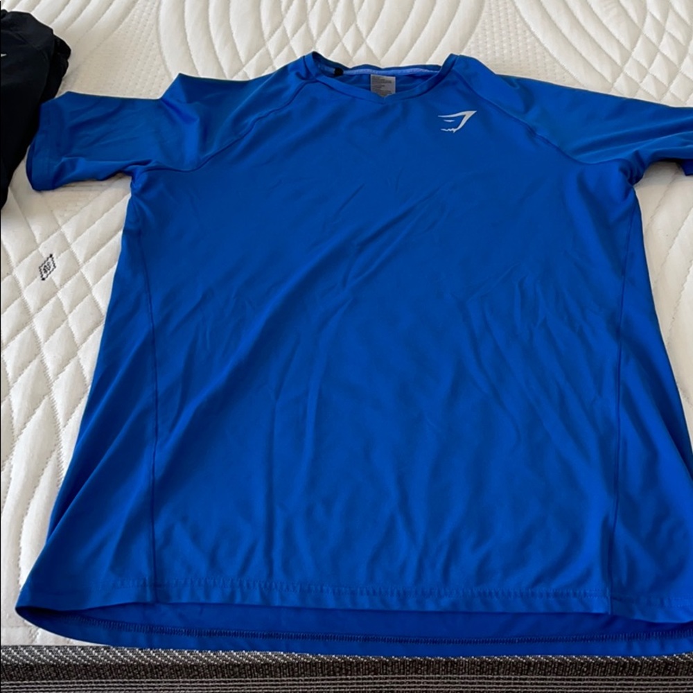 Gymshark blue arrival shirt
